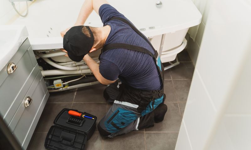 Worker Installing Bathtub